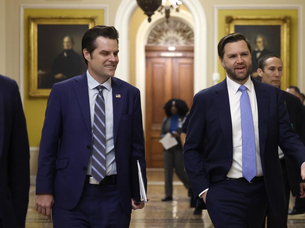 Former U.S. Rep. Matt Gaetz, who President-elect Donald Trump had nominated to be attorney general, walks alongside Vice President-elect JD Vance as they arrive for meetings with senators at the U.S. Capitol on Nov. 20, 2024 in Washington, DC.