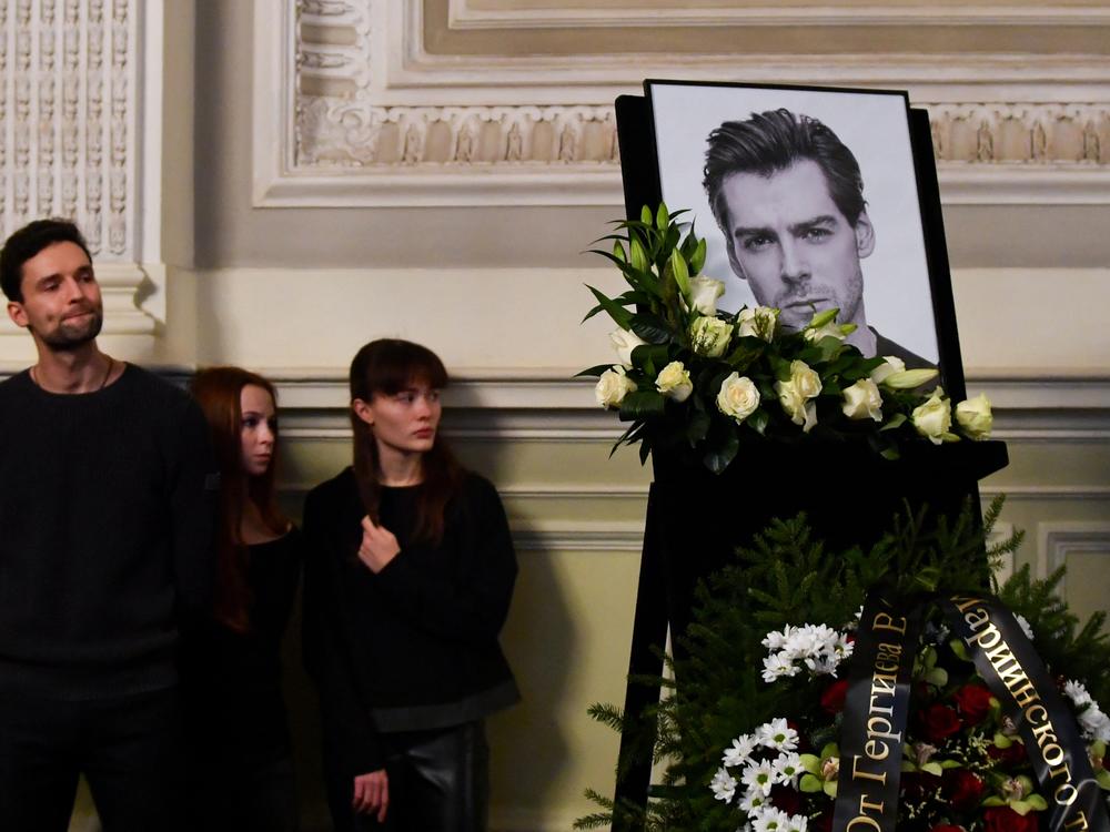 Mourners pay respects to late Russian ballet dancer Vladimir Shklyarov during a memorial service at the Mariinsky Theatre in Saint Petersburg on November 21, 2024.