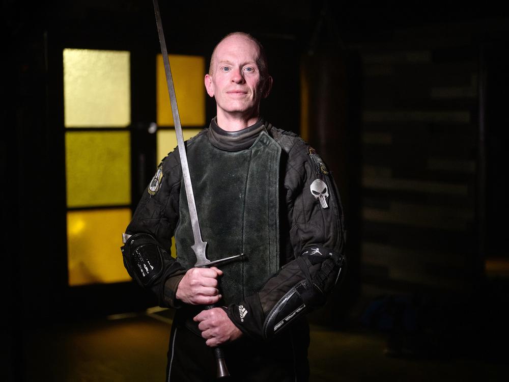 Todd Rooney, a high school English teacher, is photographed on Oct. 4. Rooney is a competitor in the long-sword tournament.