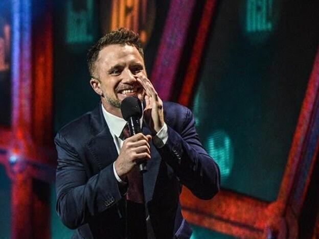 Stand-up comedian D.J. Demers is hard of hearing. To reach others in the deaf community, his shows often include a sign language interpreter. Jennifer Lees (left) has interpreted many of his shows.