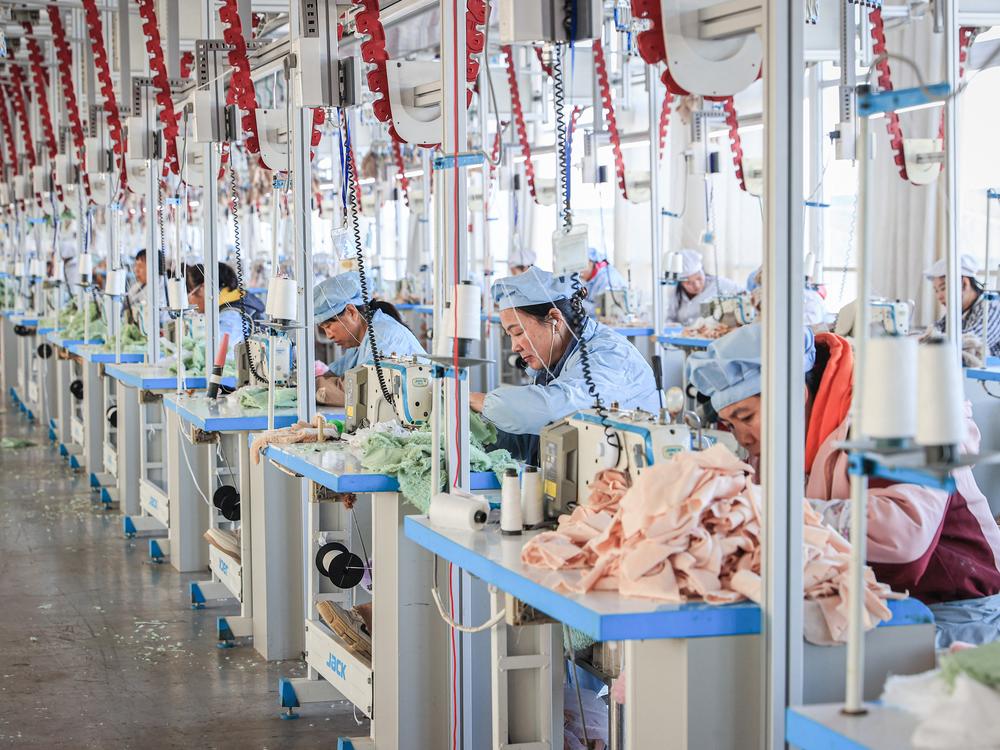 Many de minimis shipments originate in China — and a consumer advocate says the vast majority of Chinese toys imported to the U.S. pose no concerns, particularly if they're being sold by a reputable company. Here, workers produce stuffed teddy bears for export at a toy factory in Lianyungang, in eastern China's Jiangsu province, on Nov. 22, 2024.