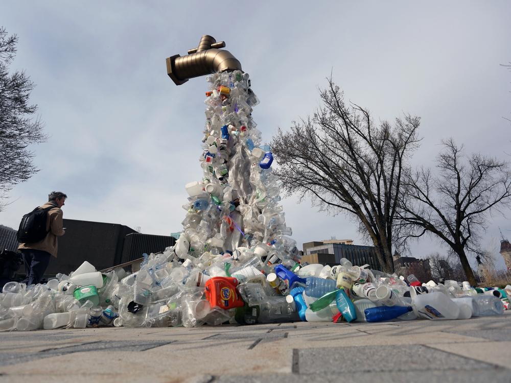 A sculpture titled <em>Giant Plastic Tap</em> by Canadian artist Benjamin Von Wong is displayed outside the fourth session of the U.N. Intergovernmental Negotiating Committee on Plastic Pollution in Ottawa, Canada, in April.
