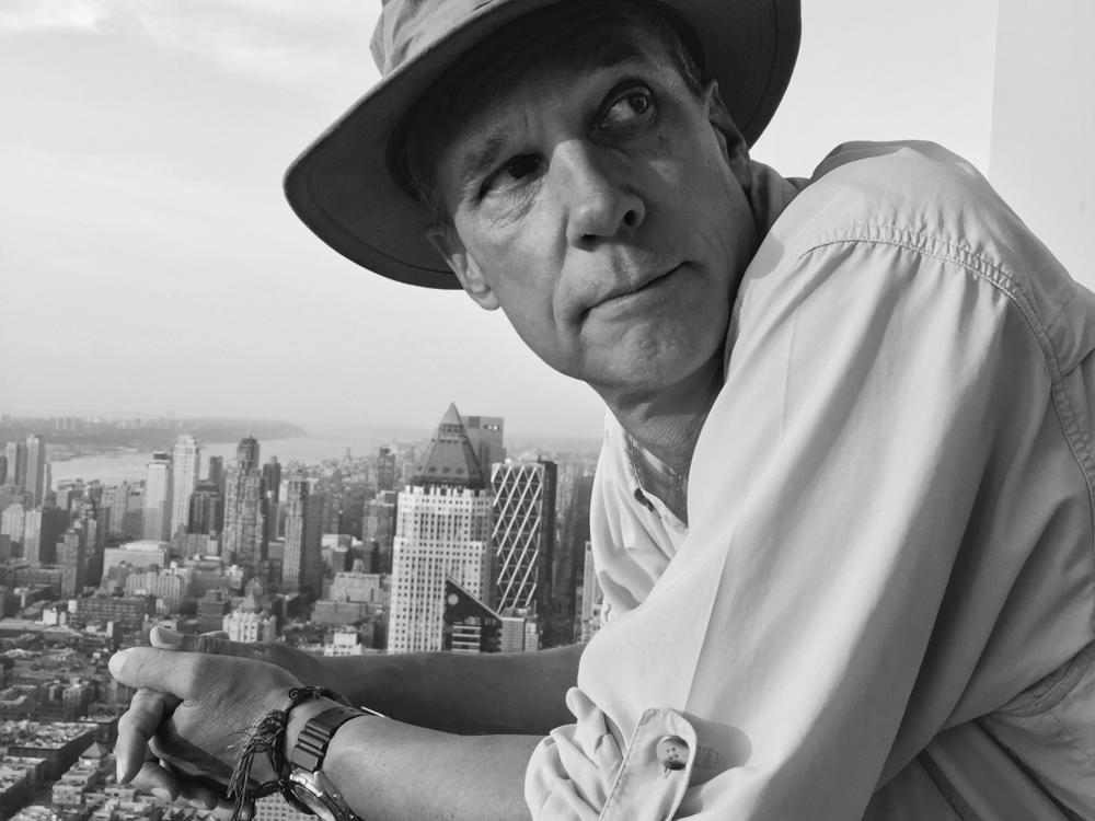 George Steinmetz, a pioneer in aerial photography, atop <em>The New York Times</em> building. His new book is <em>Feed the Planet: A Photographic Journey to the World's Food.</em>