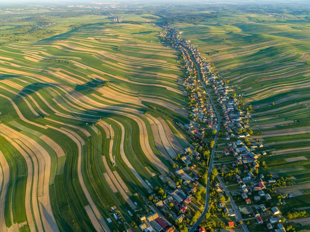 From sleepy 16th-century village to 21st-century internet sensation, Sułoszowa in southern Poland (population 6,000) earned millions of online fans after this aerial image of the one-road town went viral in 2020. It was the field system of narrow strips of farmland attached to the back of each house that caught everyone's eye. Known as a Waldhufendorf, or 
