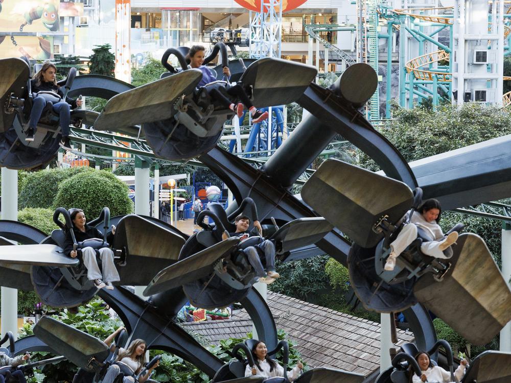 Passengers soar and whirl on a ride named after the Teenage Mutant Ninja Turtles at Nickelodeon Universe, the amusement park inside Mall of America.