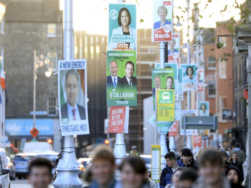 Irish election posters hang from lampposts in Dublin City centre, on Tuesday, ahead of Ireland's election on Friday.
