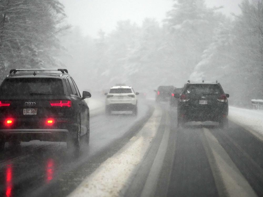 Motorists on I-89 near Lebanon, N.H., deal with the first snowstorm of the season on Thursday.