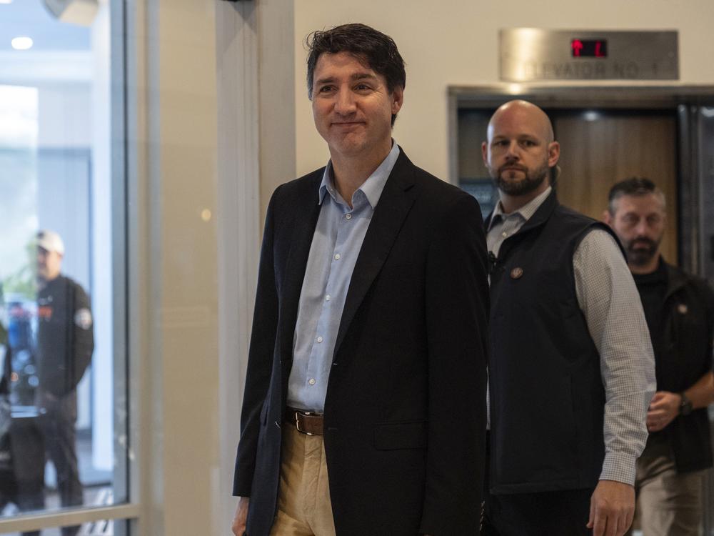 Canada Prime Minister Justin Trudeau walks through the lobby of the Delta Hotel by Marriott in West Palm Beach, Fla., on Saturday.