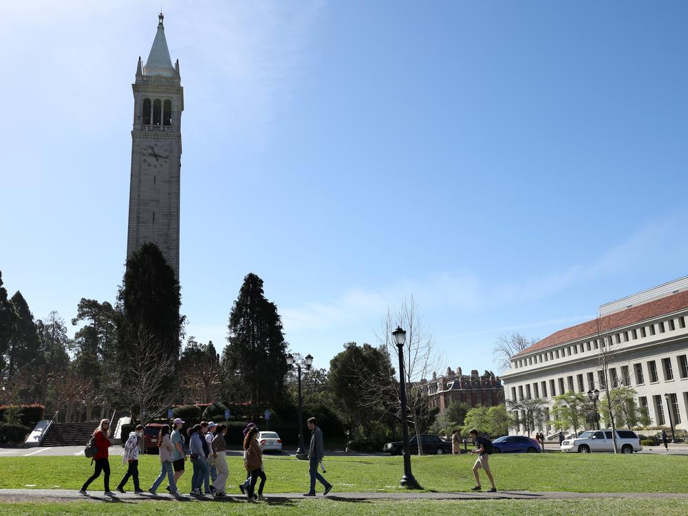 A group walks on the UC Berkeley campus on March 14, 2022, in Berkeley, Calif. California led the U.S. in international enrollment, with over 140,000 international students attending schools there in the 2023-24 academic year, according to the Institute of International Education.
