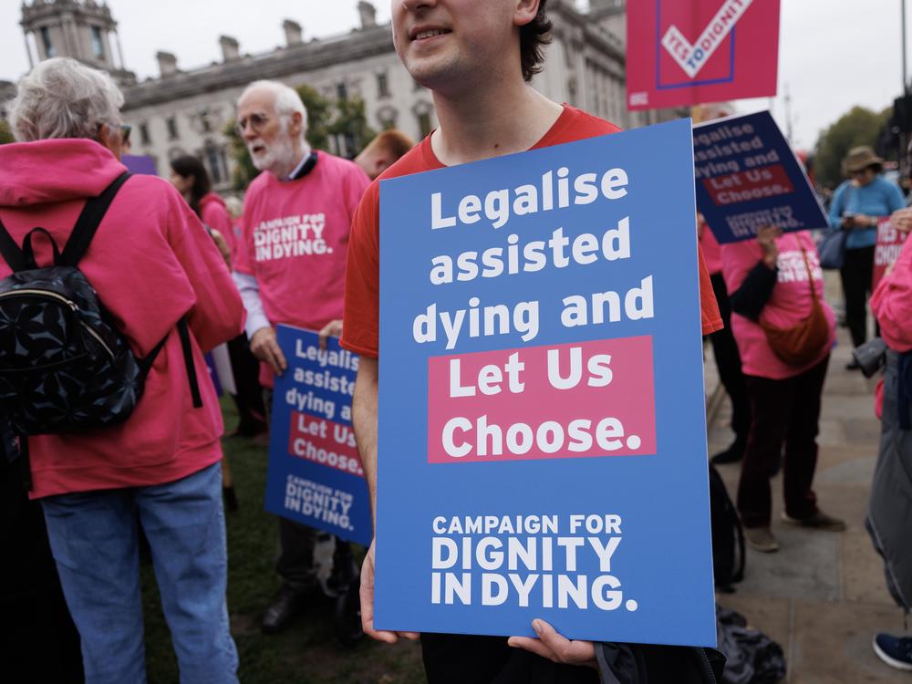 Campaigners in Parliament Square in favor of the proposed bill to legalize assisted dying, on Oct. 16 in London.