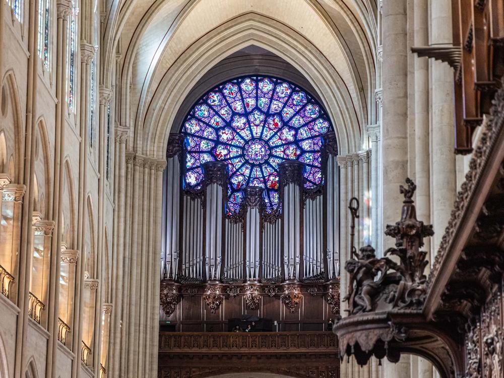 This photograph shows the stained glass Rose Window of the Notre Dame cathedral in Paris.