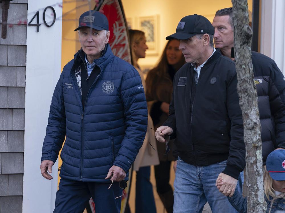 President Biden and his son Hunter Biden walk in downtown Nantucket, Mass., on Friday.