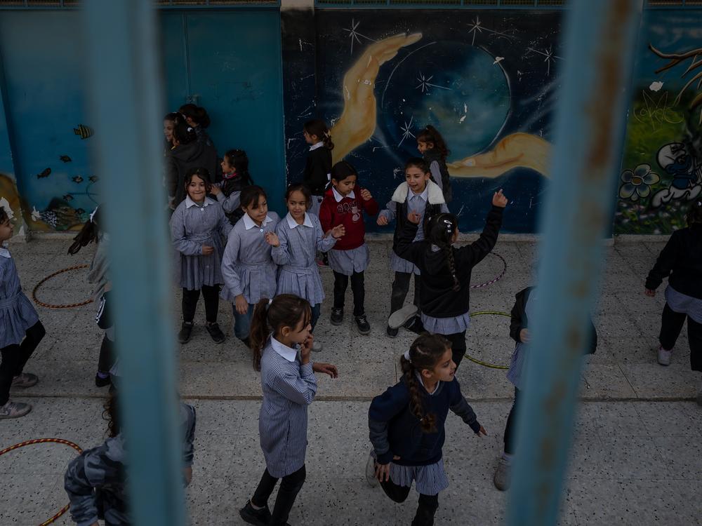 Schoolgirls at an UNRWA school in Qalandia, in the West Bank, on Nov. 14.