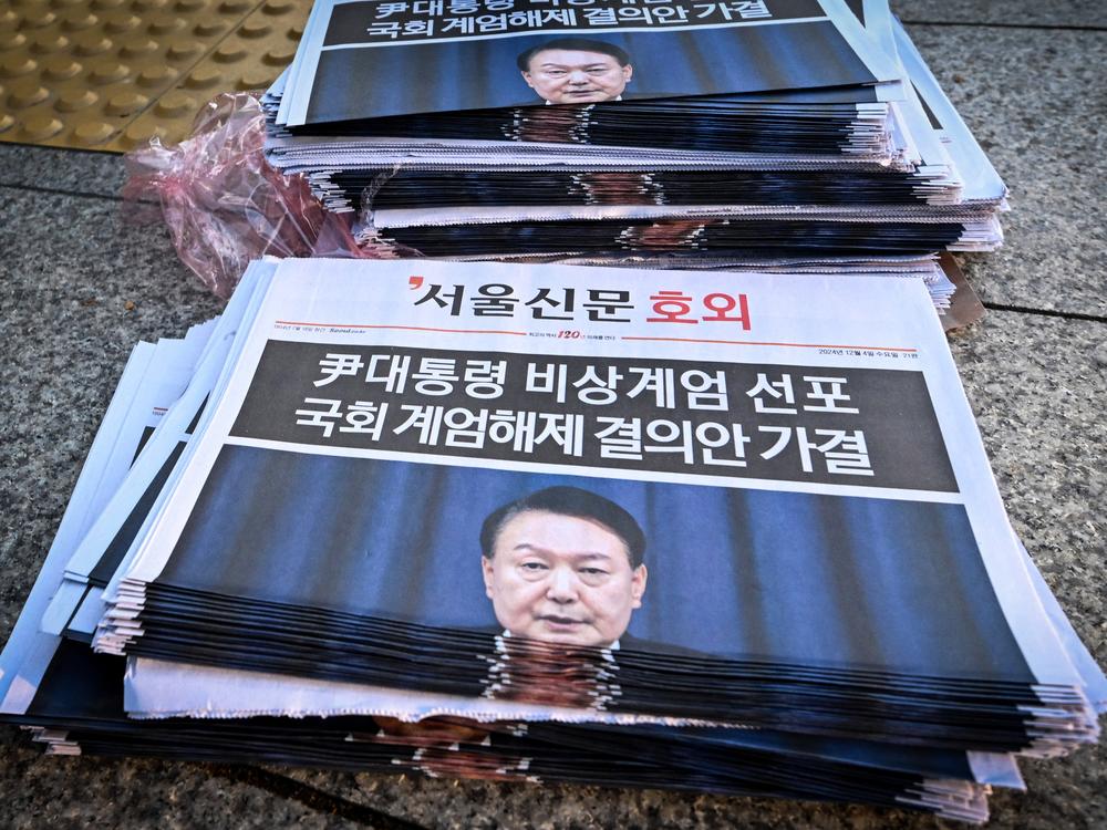 Extra edition newspapers are displayed at a subway gate in downtown Seoul on Wednesday after martial law was lifted.