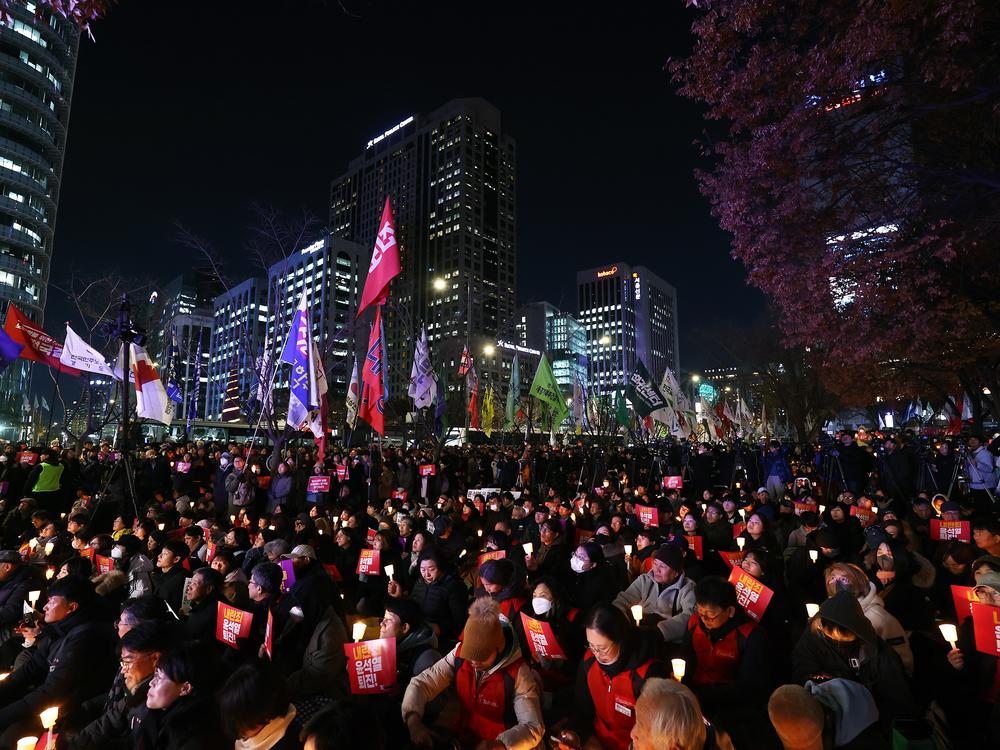 Protesters demonstrate against the country's president on Wednesday in Seoul.