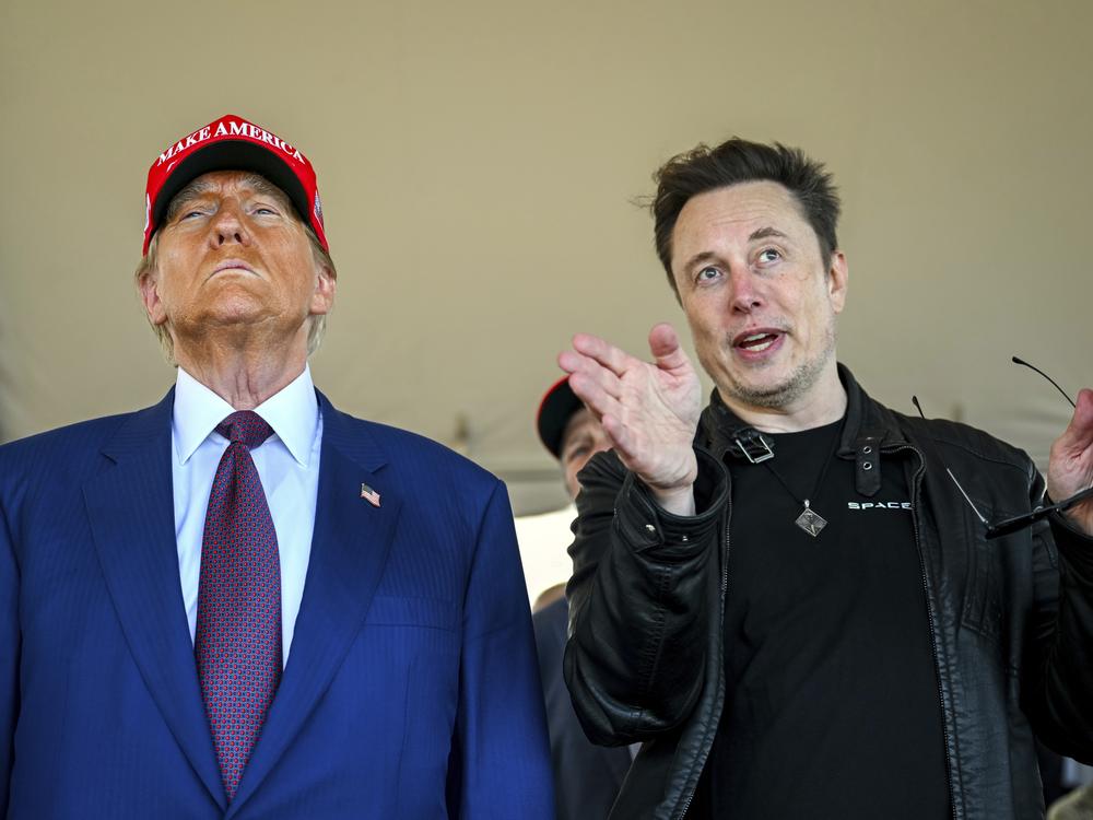 President-elect Donald Trump listens to Elon Musk as he arrives to watch SpaceX's mega rocket Starship lift off for a test flight from Starbase in Boca Chica, Texas, on Nov. 19.