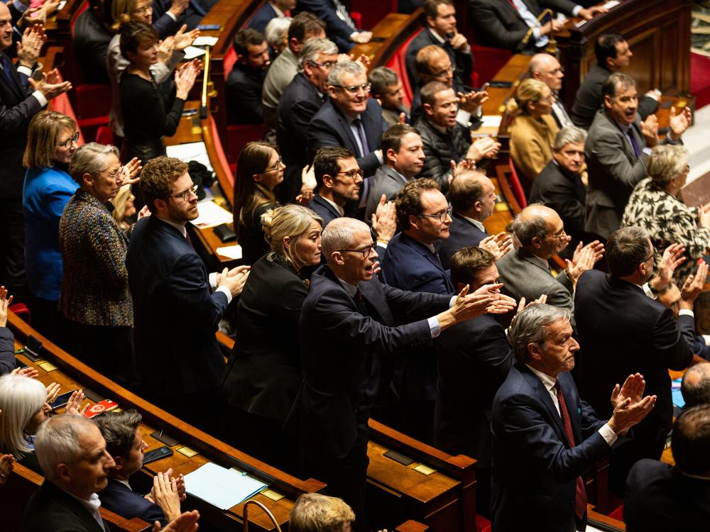 French lawmakers debate in the National Assembly in Paris Wednesday. A majority of legislators voted to oust Prime Minister Michel Barnier, forcing him to resign.