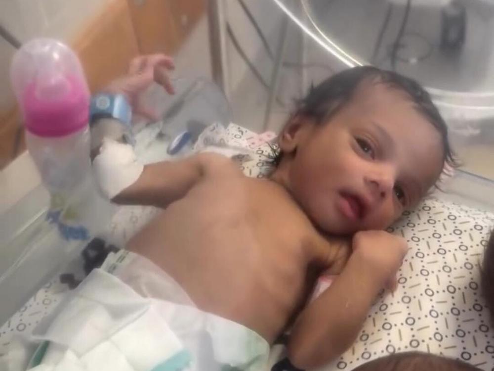 Baby Malak, then about a month old and identified only as 