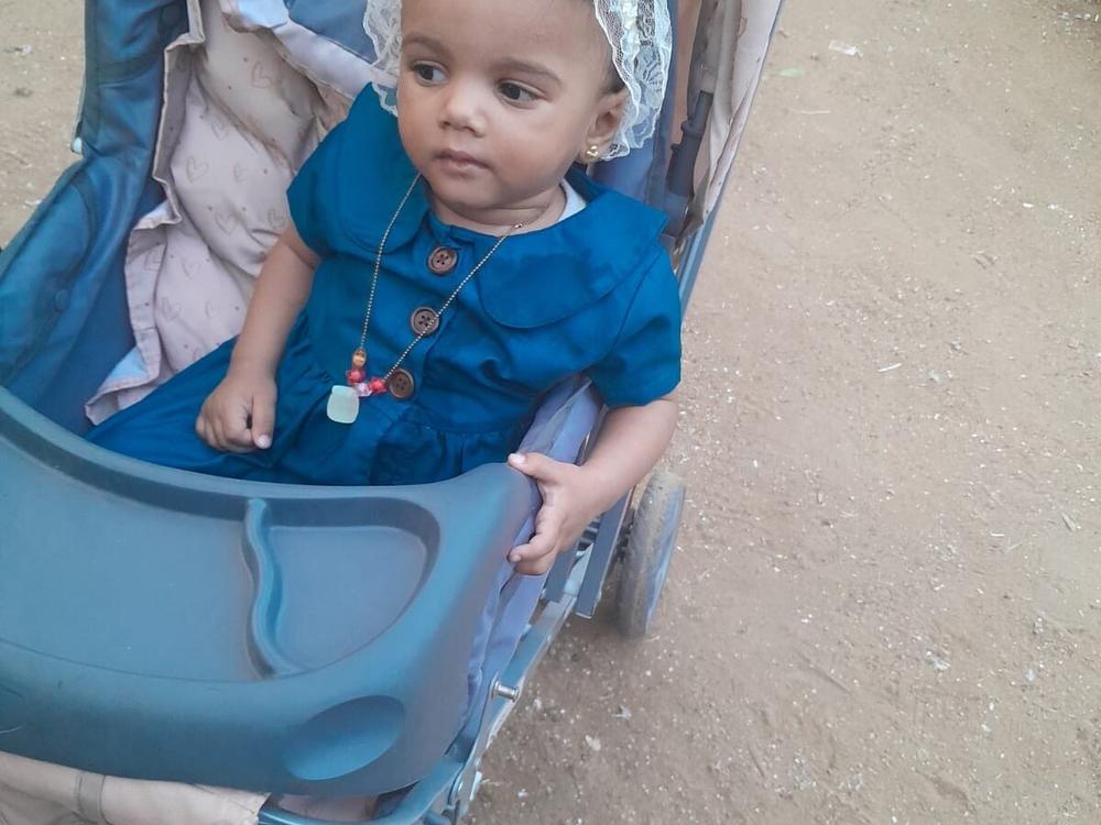In August, Malak is taken to a park in Deir al-Balah for the first time in weeks. Abu Khatleh had feared taking her out the previous month due to ongoing fighting.