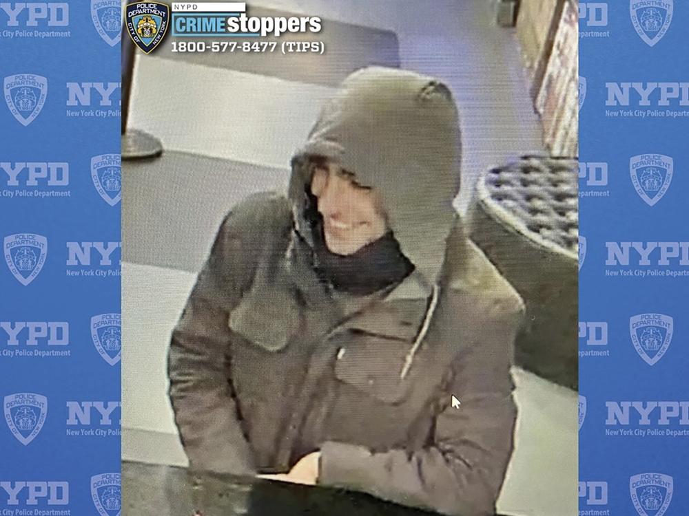 This image provided by the New York City Police Department shows a person of interest in the investigation of the killing of UnitedHealthcare CEO Brian Thompson outside a Manhattan hotel on Wednesday.