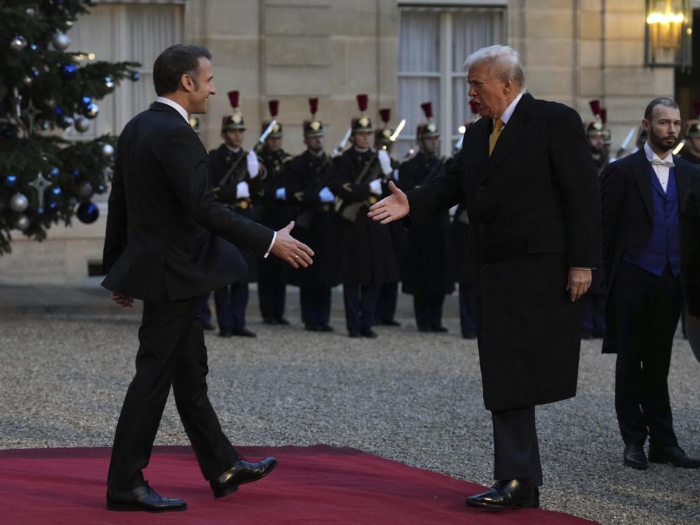 French President Emmanuel Macron, left, is to shake hands with President-elect Donald Trump as he arrives at the Elysee Palace, on Saturday.