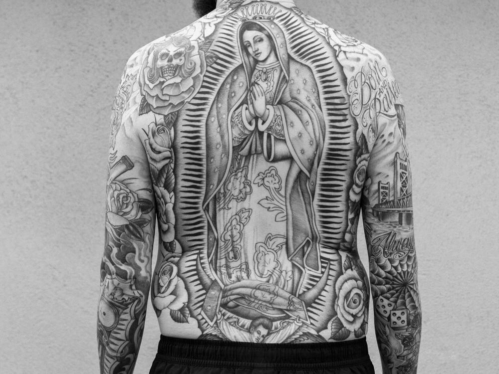 <em>Nuestra Madre</em>, Sacramento, Californiam 2019. Tyler Wichmann shares his Our Lady of Guadalupe back tattoo, created by renowned tattoo artist Chuco Moreno.