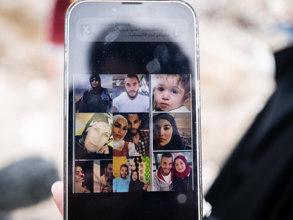 On Dec. 4, Fatima Salah shows a picture on her phone of her cousins who were killed.