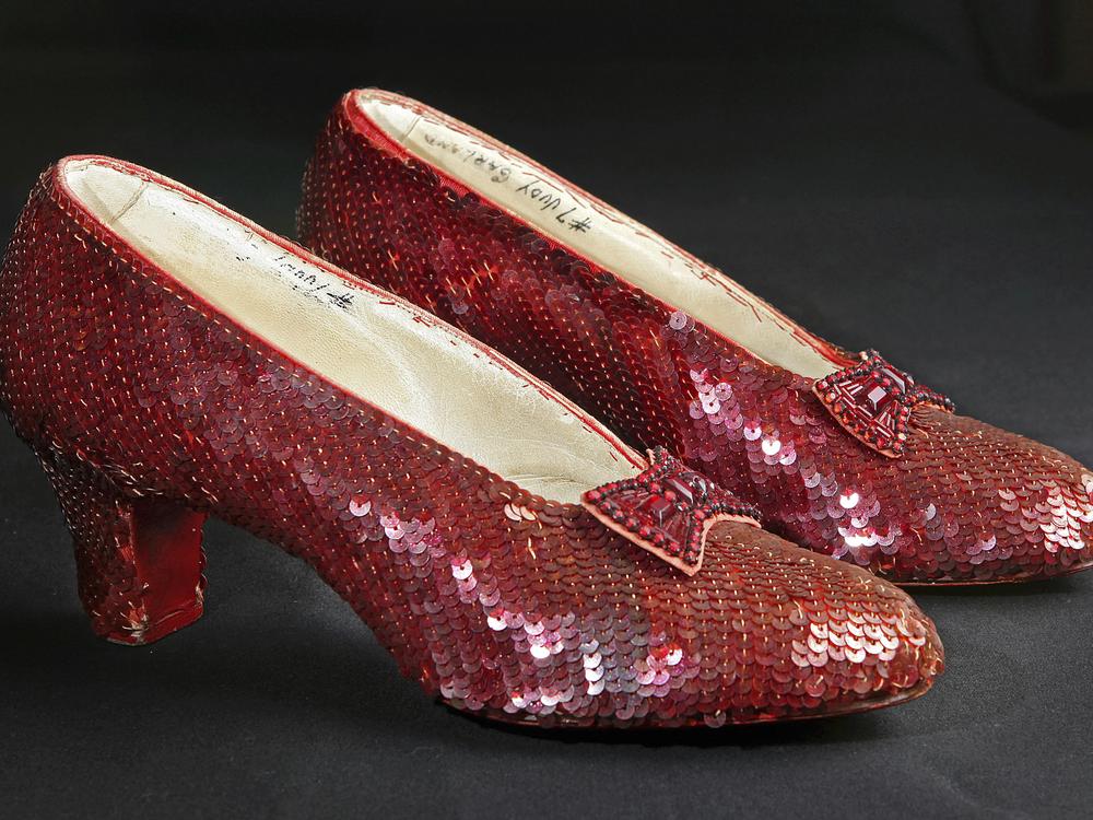 Sequin-covered ruby slippers worn by Judy Garland in <em>The Wizard of Oz</em> appear at the offices of Profiles in History in Calabasas, Calif. on Nov. 9, 2001.