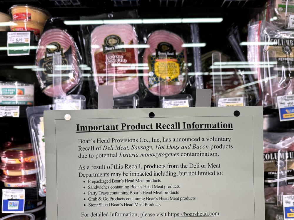 A recall notice citing listeria contamination risks is posted next to Boar's Head meats in a Safeway store in San Rafael, Calif., in July, as the deli meat company expanded its recall of ready-to-eat meat and poultry products.