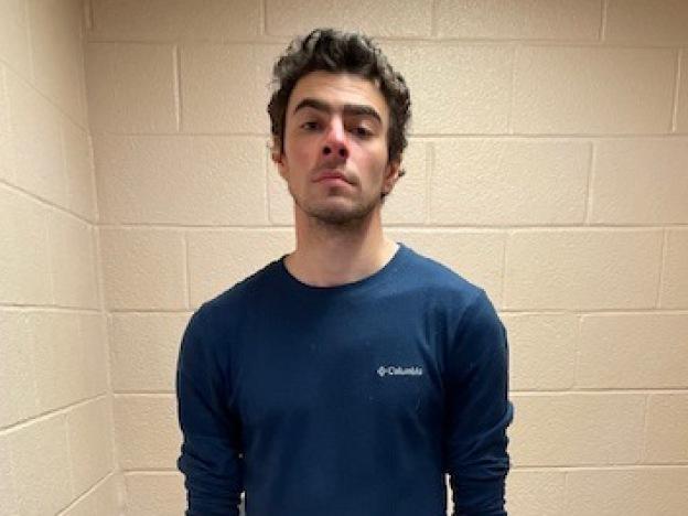 In this handout photo released by the Altoona Police Department, Luigi Mangione is seen in a holding cell after being taken into custody on Dec. 9, 2024, in Altoona, Pa.