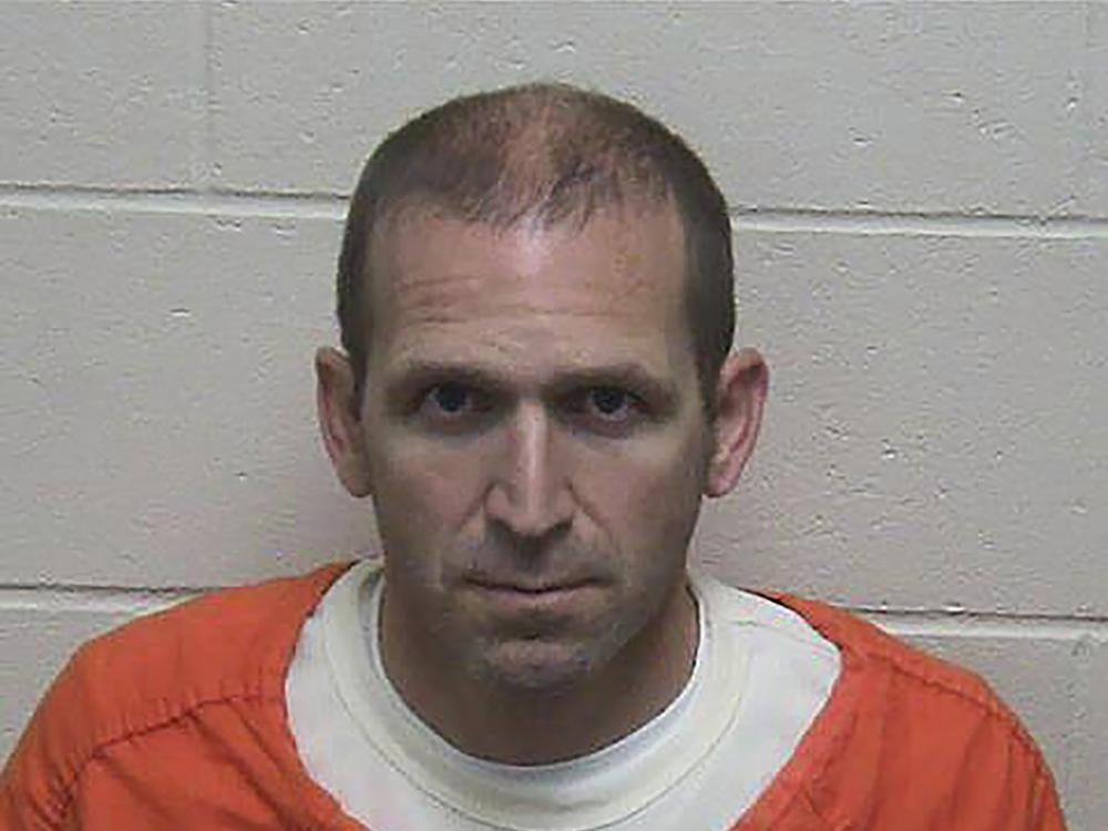 This photo released by the Green Lake County Sheriff's Office in Wisconsin shows Ryan Borgwardt's booking photo on Tuesday.