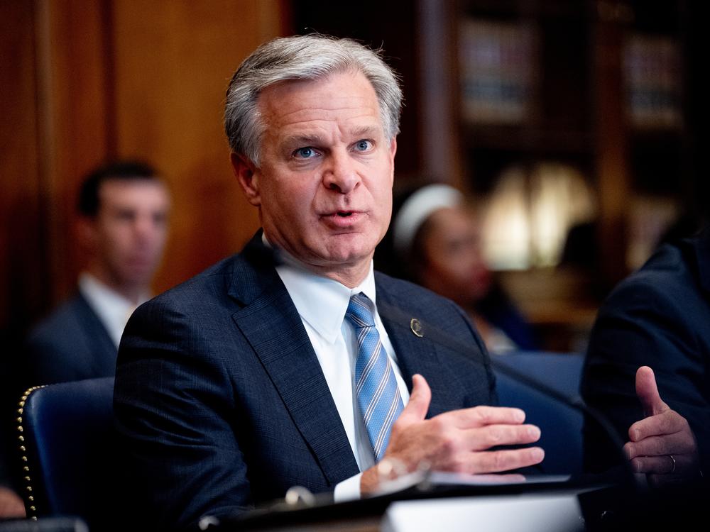 FBI Director Christopher Wray speaks during an Election Threats Task Force meeting at the Justice Department in September 2024.