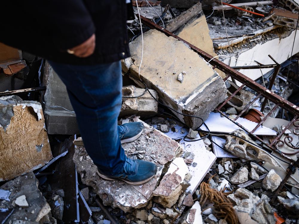 Khalil Moussa Shoumar, standing in the rubble of his Nabatieh home, says he expects Hezbollah will help him rebuild again now as it did in 2006.