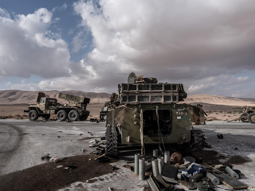 Abandoned Syrian military vehicles on the road to the location where Timmerman was handed over to U.S. forces.