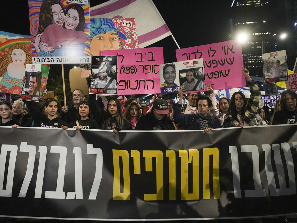 Israelis protest against Prime Minister Benjamin Netanyahu's government and call for the release of hostages held in the Gaza Strip by the Hamas militant group, in Tel Aviv, Israel, on Dec. 14, 2024.