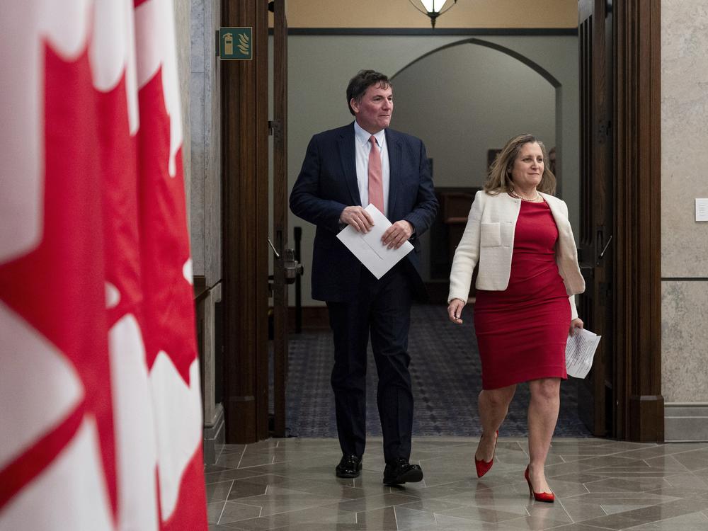Minister of Finance and Deputy Prime Minister Chrystia Freeland, right, and Minister of Public Safety, Democratic Institutions and Intergovernmental Affairs Dominic LeBlanc arrive for a news conference on Parliament Hill in Ottawa, Ontario, on Dec. 11, 2024.