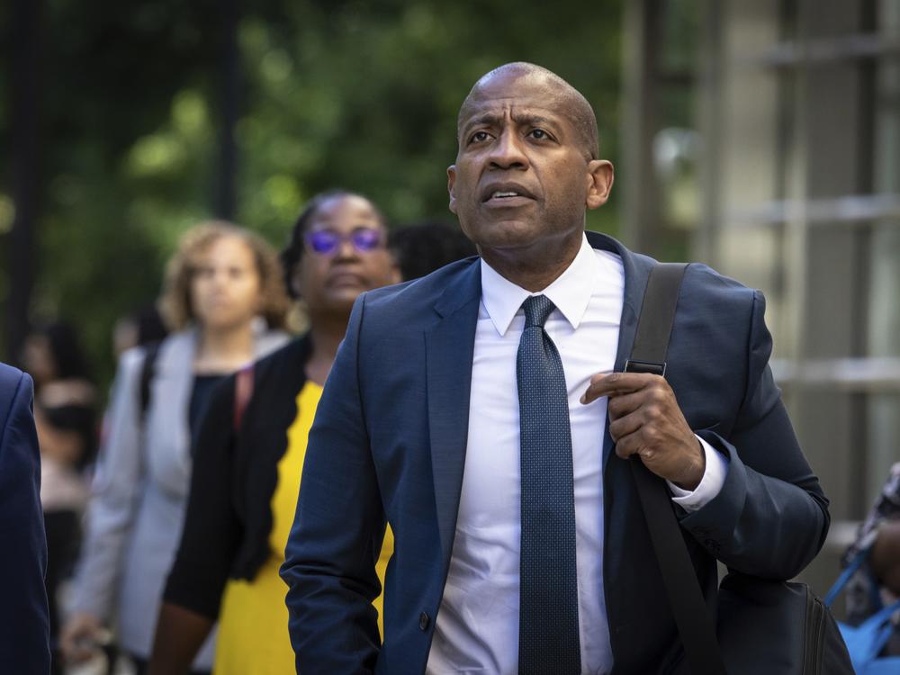 FILE - Carlos Watson leaves Brooklyn federal court after testifying in his own defense in New York, July 1, 2024.