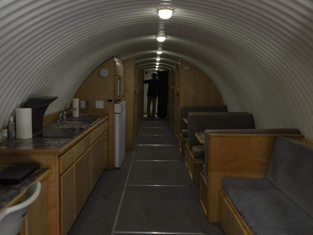 The owner, who asked not to be identified because of concerns about his privacy, turns on the lights in his underground shelter in an undisclosed Southern California city, on Dec. 16.