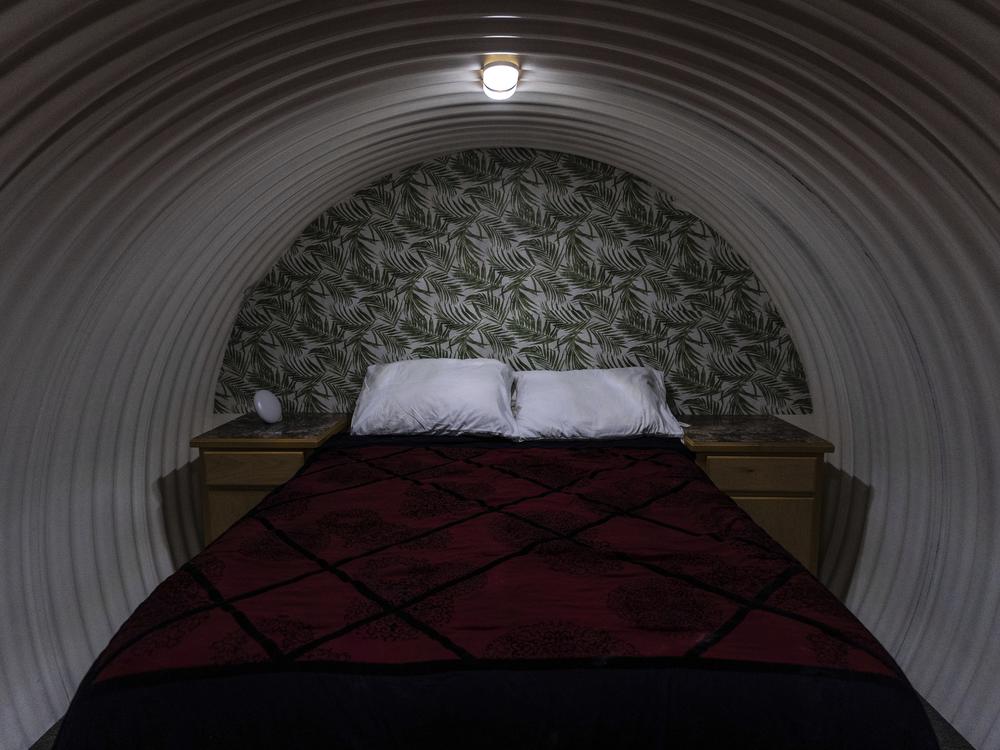 A bedroom is shown inside an underground shelter in an undisclosed Southern California city, Monday, Dec. 16, 2024.
