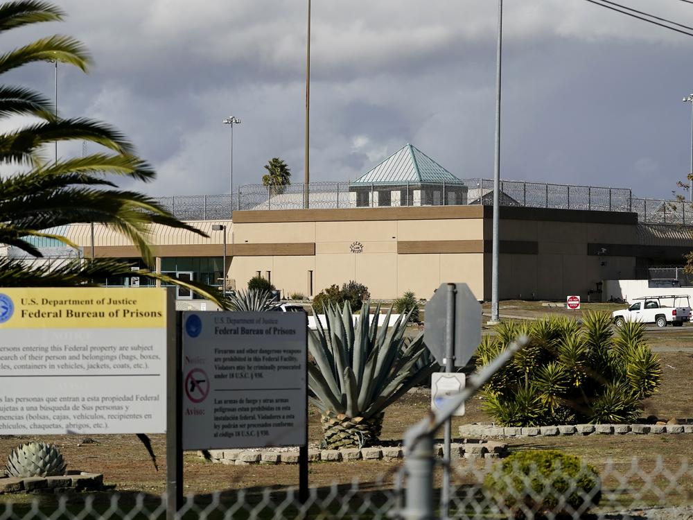 The Federal Correctional Institution stands in Dublin, Calif., Dec. 5, 2022. The U.S. government will pay nearly $116 million to resolve lawsuits brought by more than 100 women who say they were abused or mistreated at a now-shuttered federal prison in California that was known as the 