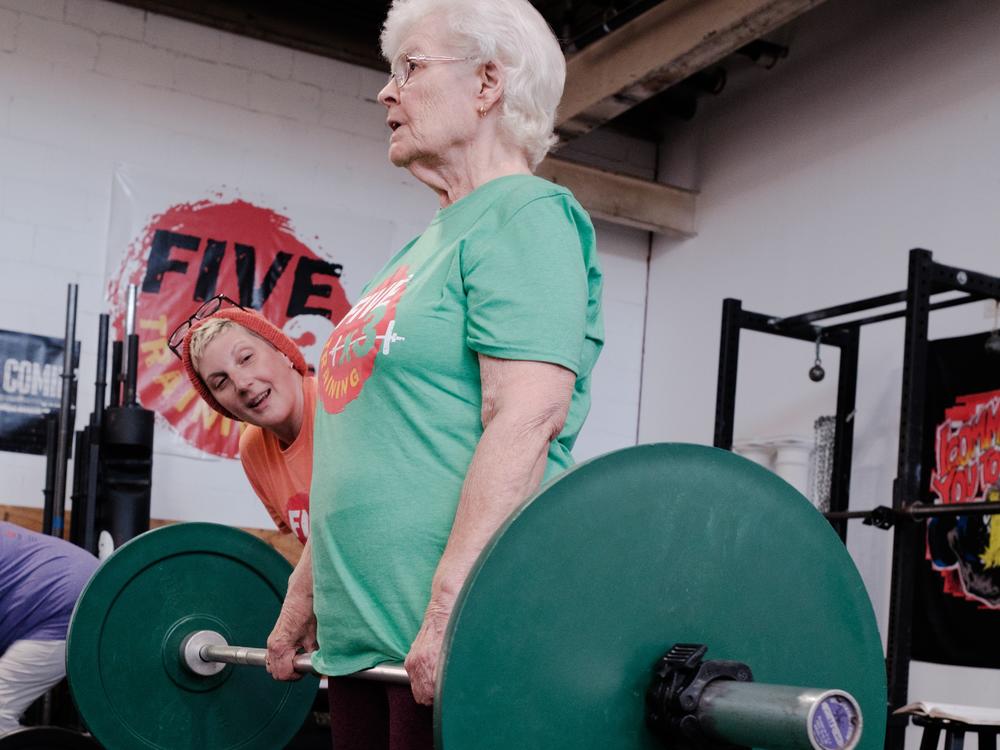 Mona Noyes, 86, works out with trainer Emily Socolinsky at Fivex3 Training in Baltimore.