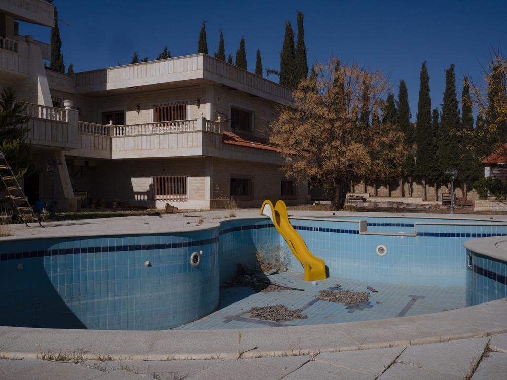 The swimming pool is dirty and abandoned at a building where Captagon was being made before Assad fell.