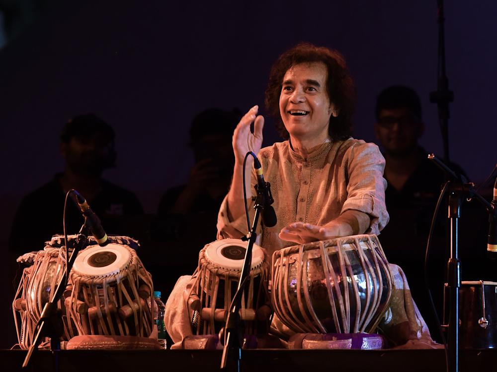 Indian tabala virtuoso Ustad Zakir Hussain performs at a concert at the Indian Music Experience (IME), Indias first interactive music museum, in Bangalore on July 27, 2019.