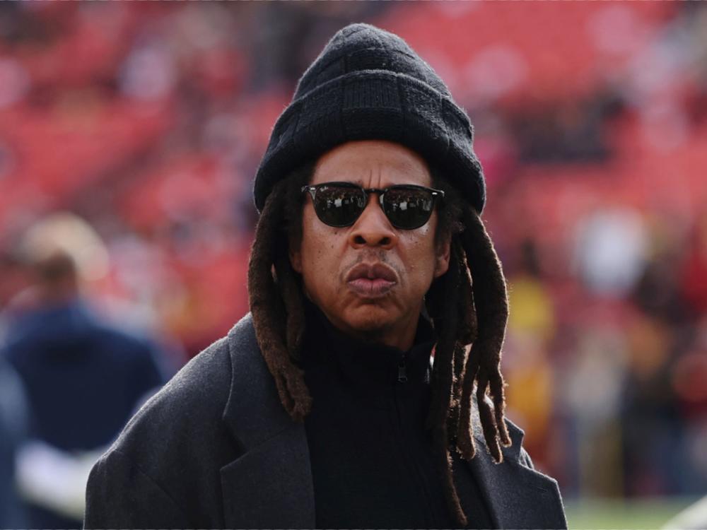 Rapper Jay-Z looks on before a game between the Washington Commanders and the Dallas Cowboys at Northwest Stadium on November 24, 2024 in Landover, Maryland.
