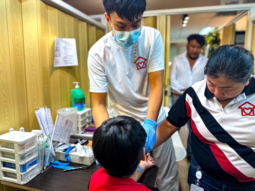 An HIV-positive child gets his blood drawn at Project Red Ribbon, an HIV care and advocacy nonprofit in the Philippines.