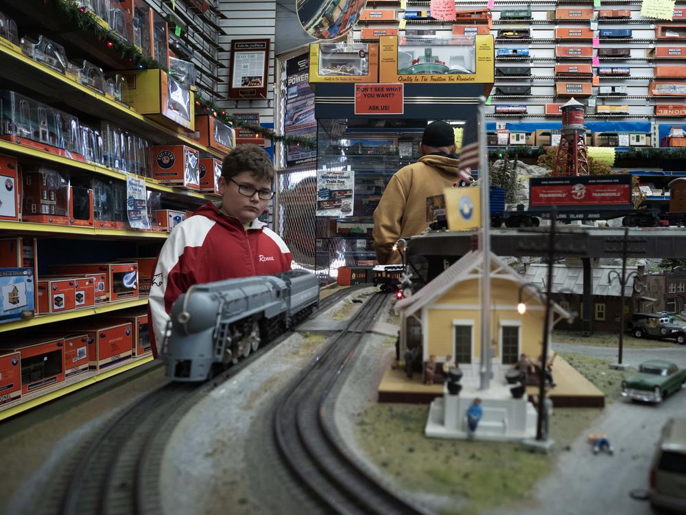 Caden Renna watches the Lionel layout at TrainLand. He came to the store to buy his first Lionel train, a Christmas gift from his grandmother.