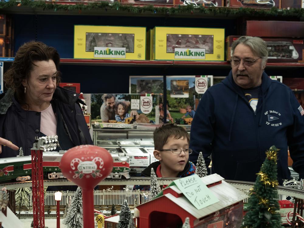 Customers at TrainLand on Long Island enjoy a special Christmas layout.