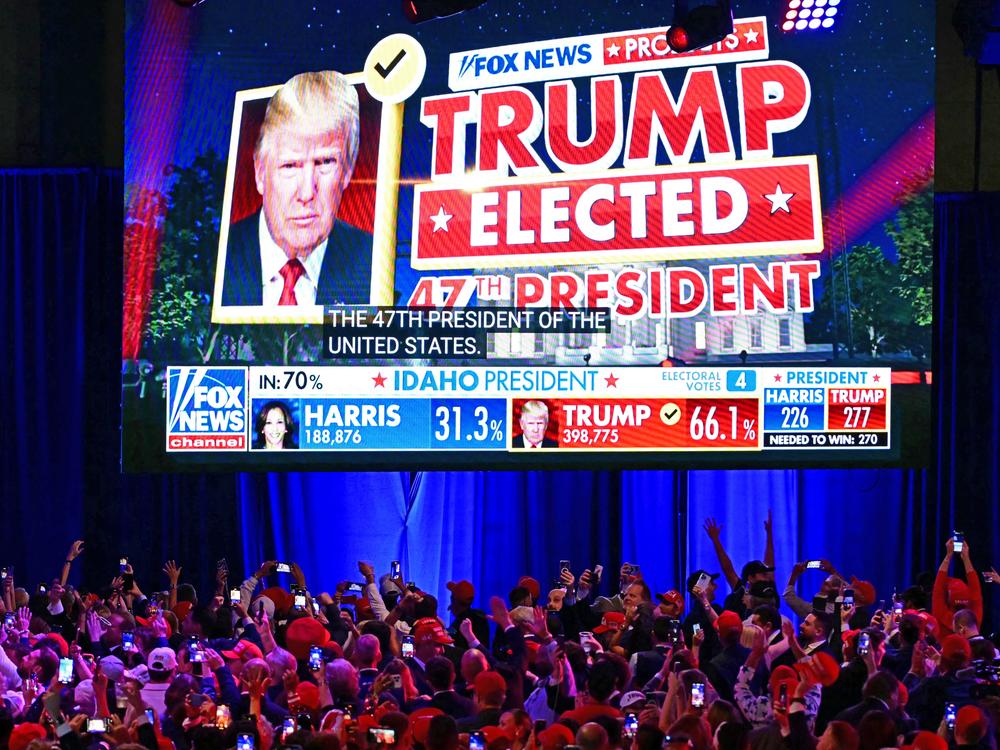 Supporters of Republican presidential candidate Donald Trump celebrate as Fox News declares him the next U.S. president during an election night event in West Palm Beach, Fla., early on Nov. 6.