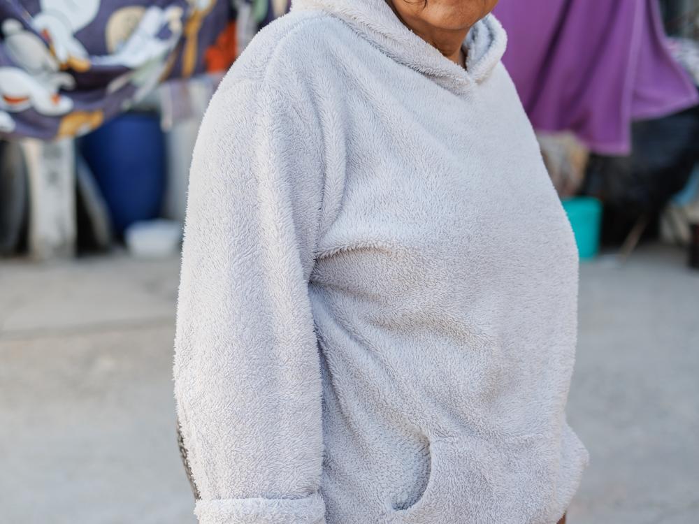 Zoila Argentina Velasco Caňas, 68, from El Salvador poses for a portrait at El Buen Samaritano migrant shelter in Ciudad Juárez, Chihuahua state, Mexico on Monday, December 9, 2024. Zoila received an appointment through the CBP One application and will cross on December 17.