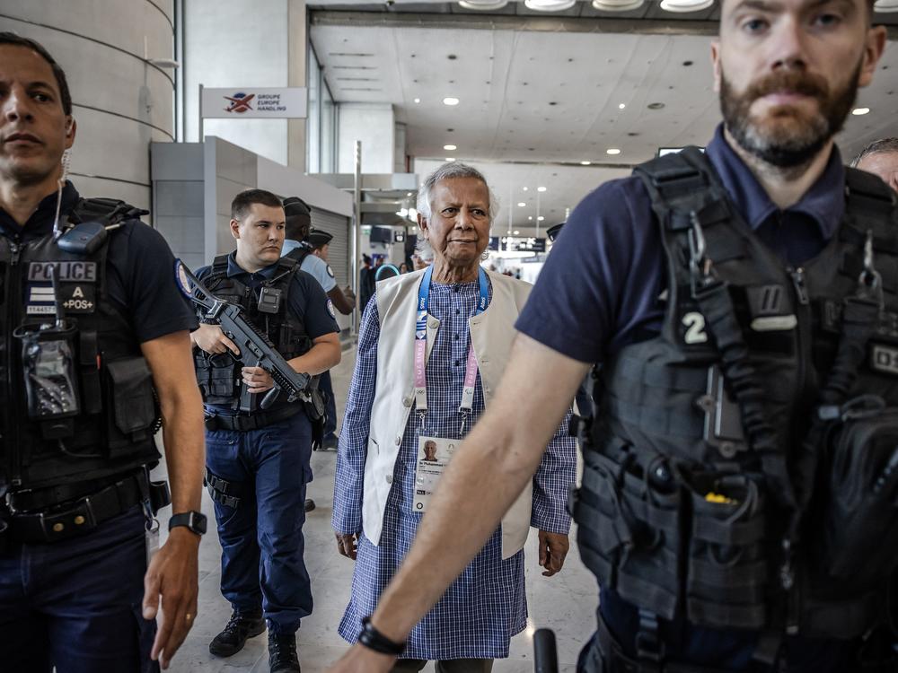 Nobel Peace Prize laureate Muhammad Yunus heads back to Bangladesh from Paris after his country's revolution in August. He is now the country's interim leader.